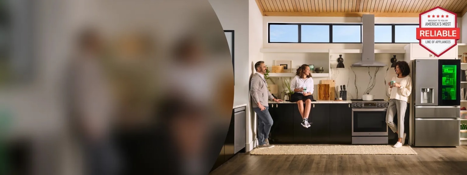 People standing in a luxury kitchen  with LG Appliances